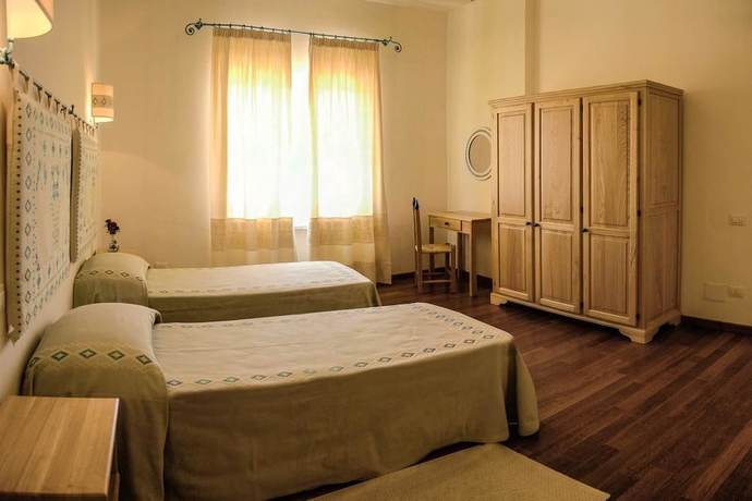 Imagen de la habitación del Hotel Albergo Diffuso Omu Axiu. Foto 10