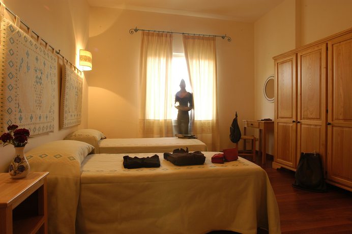 Imagen de la habitación del Hotel Albergo Diffuso Omu Axiu. Foto 12
