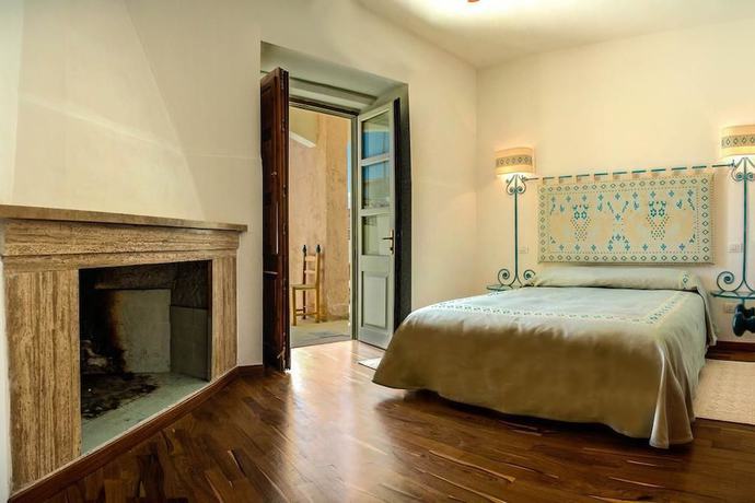 Imagen de la habitación del Hotel Albergo Diffuso Omu Axiu. Foto 14