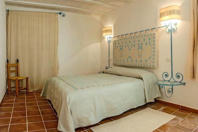 Imagen de la habitación del Hotel Albergo Diffuso Omu Axiu. Foto 15