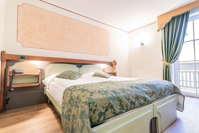 Imagen de la habitación del Hotel Albergo Dimaro Wellness and Family. Foto 7