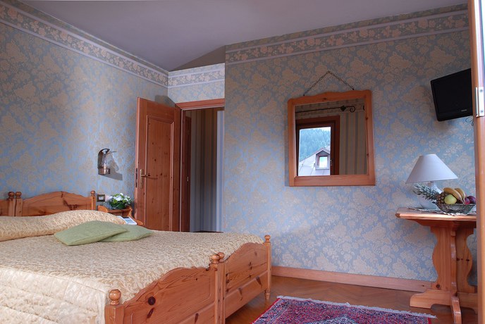 Imagen de la habitación del Hotel Albergo Dolomiti. Foto 15