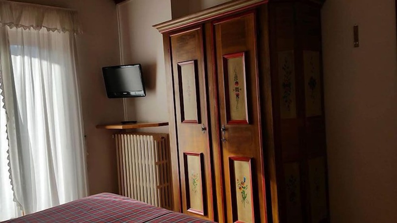 Imagen de la habitación del Hotel Albergo Dolomiti. Foto 17
