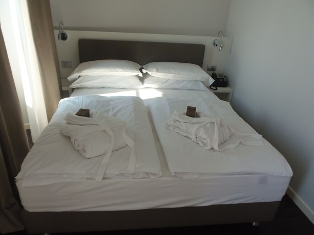 Imagen de la habitación del Hotel Albergo Dongo. Foto 11