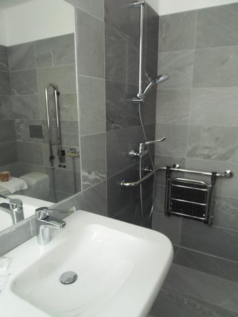 Imagen de la habitación del Hotel Albergo Dongo. Foto 16