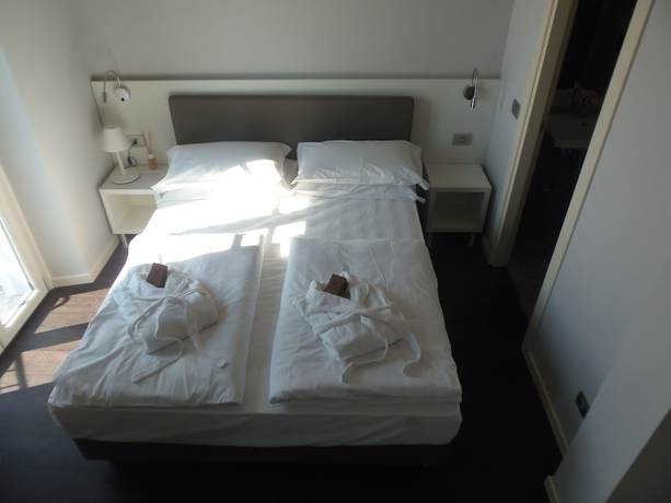 Imagen de la habitación del Hotel Albergo Dongo. Foto 17