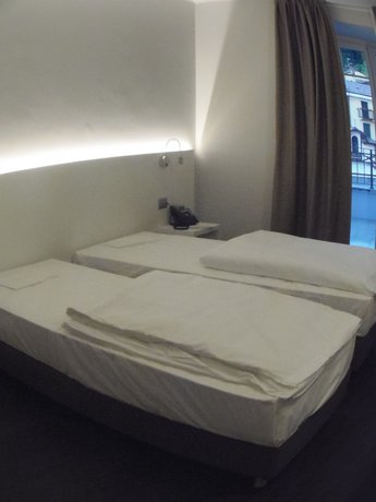 Imagen de la habitación del Hotel Albergo Dongo. Foto 19