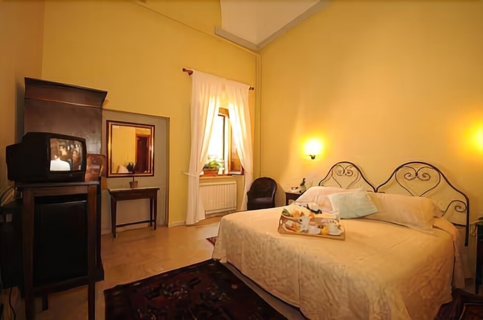 Imagen de la habitación del Hotel Albergo Duomo. Foto 6