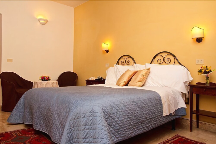 Imagen de la habitación del Hotel Albergo Duomo. Foto 13