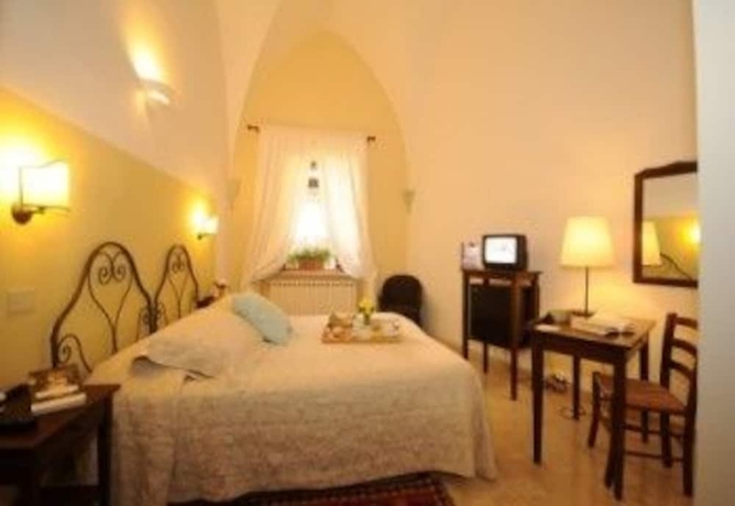 Imagen de la habitación del Hotel Albergo Duomo, Montepulciano. Foto 8