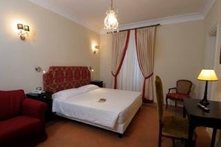 Imagen de la habitación del Hotel Albergo Duomo, San Gemini. Foto 2