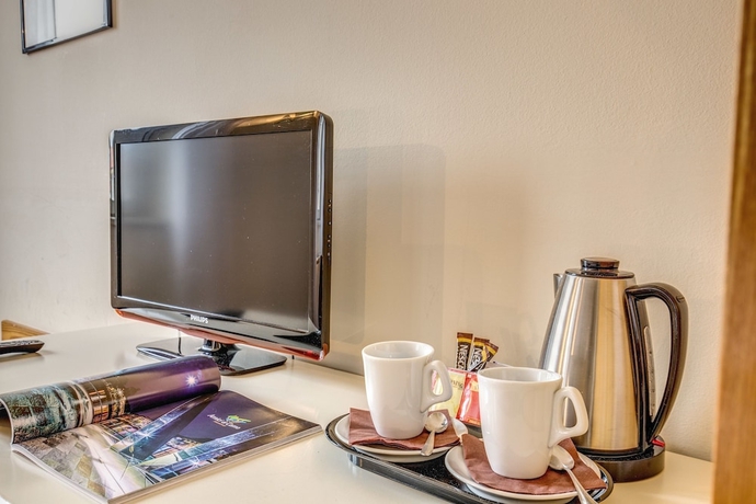 Imagen de la habitación del Hotel Albergo Firenze, Como. Foto 10