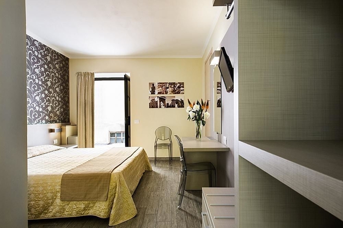 Imagen de la habitación del Hotel Albergo Firenze, Florencia. Foto 2