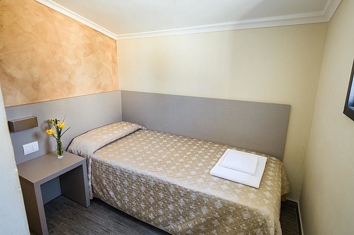 Imagen de la habitación del Hotel Albergo Firenze, Florencia. Foto 5