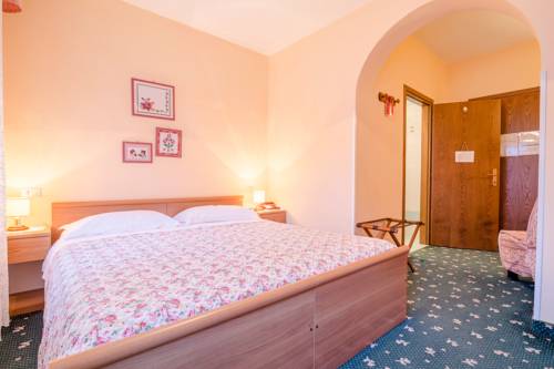 Imagen de la habitación del Hotel Albergo Genzianella, Sottoguda. Foto 8