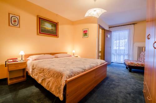 Imagen de la habitación del Hotel Albergo Genzianella, Sottoguda. Foto 10
