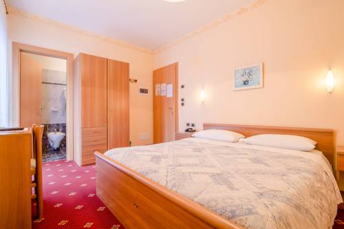 Imagen de la habitación del Hotel Albergo Genzianella, Sottoguda. Foto 12