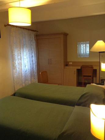 Imagen de la habitación del Hotel Albergo Giugni. Foto 15