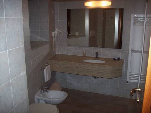 Imagen de la habitación del Hotel Albergo Il Cacciatore. Foto 4