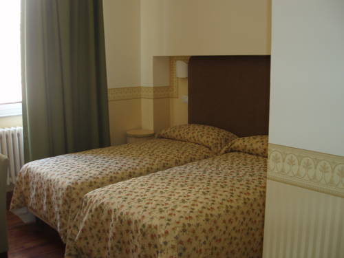 Imagen de la habitación del Hotel Albergo Il Cacciatore. Foto 9