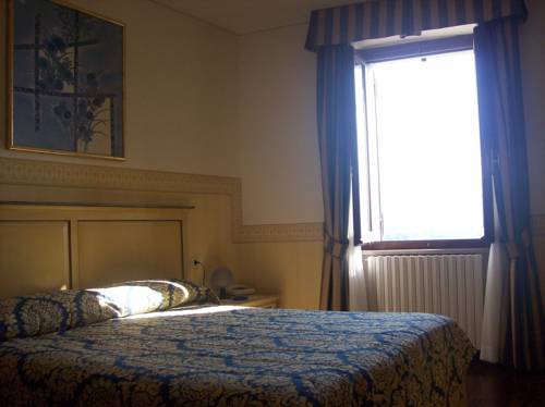 Imagen de la habitación del Hotel Albergo Il Cacciatore. Foto 11