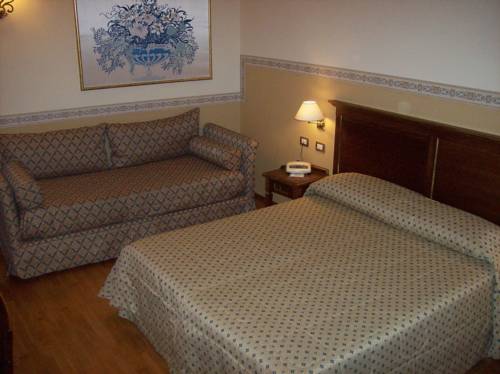 Imagen de la habitación del Hotel Albergo Il Cacciatore. Foto 15