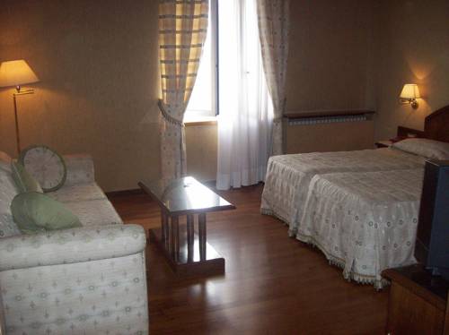 Imagen de la habitación del Hotel Albergo Il Cacciatore. Foto 16