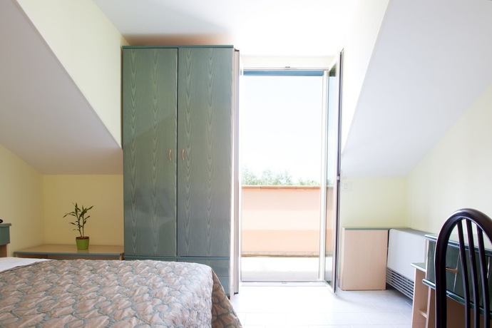 Imagen de la habitación del Hotel Albergo Il Giardino. Foto 15