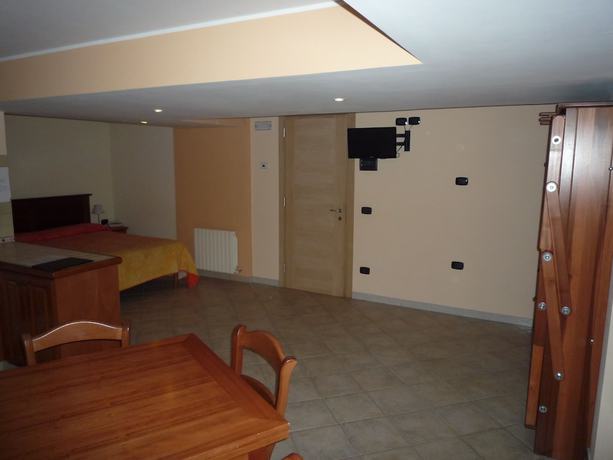 Imagen de la habitación del Hotel Albergo Il Giardino del Rio. Foto 4