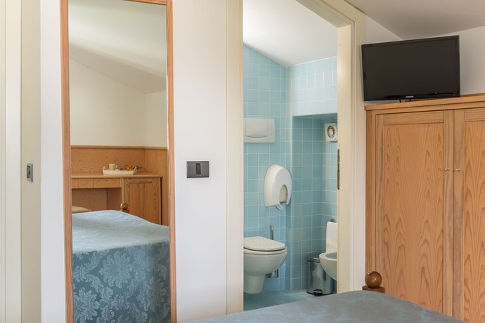 Imagen de la habitación del Hotel Albergo Il Giardino del Rio. Foto 5