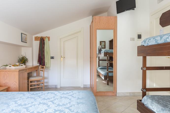 Imagen de la habitación del Hotel Albergo Il Giardino del Rio. Foto 8