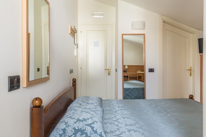 Imagen de la habitación del Hotel Albergo Il Giardino del Rio. Foto 10