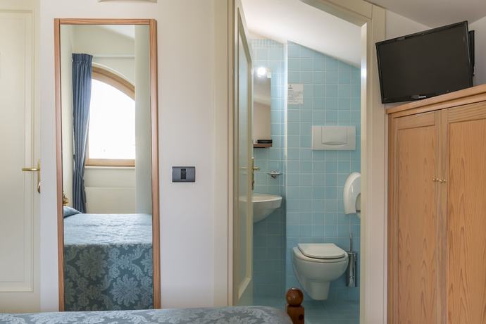 Imagen de la habitación del Hotel Albergo Il Giardino del Rio. Foto 12