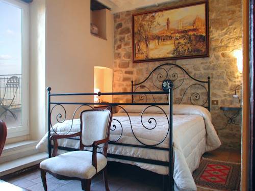 Imagen de la habitación del Hotel Albergo Il Giglio, Montalcino. Foto 4