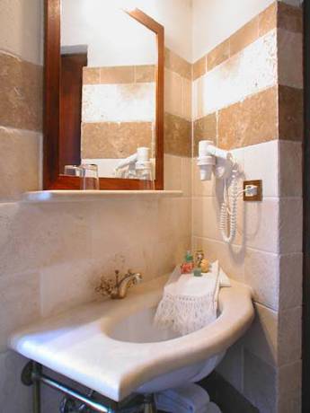 Imagen de la habitación del Hotel Albergo Il Giglio, Montalcino. Foto 5