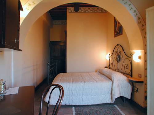 Imagen de la habitación del Hotel Albergo Il Giglio, Montalcino. Foto 6