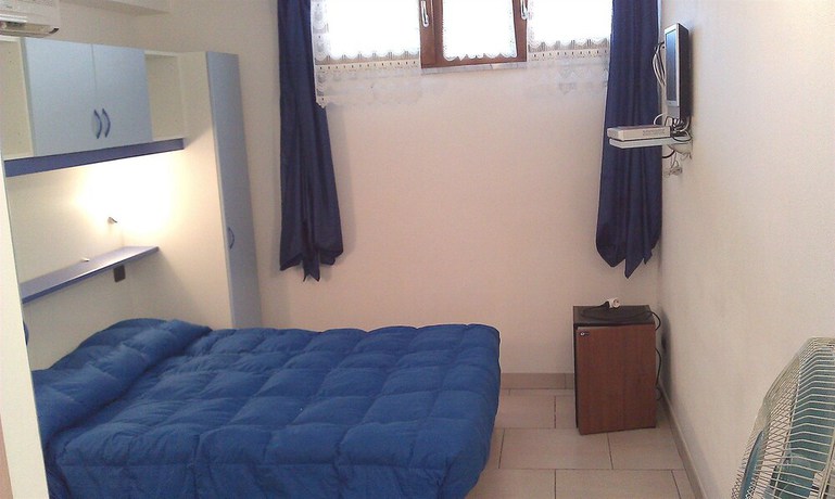 Imagen de la habitación del Hotel Albergo La Lampara. Foto 5