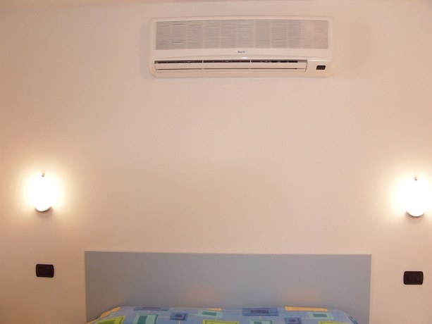 Imagen de la habitación del Hotel Albergo La Lampara. Foto 8