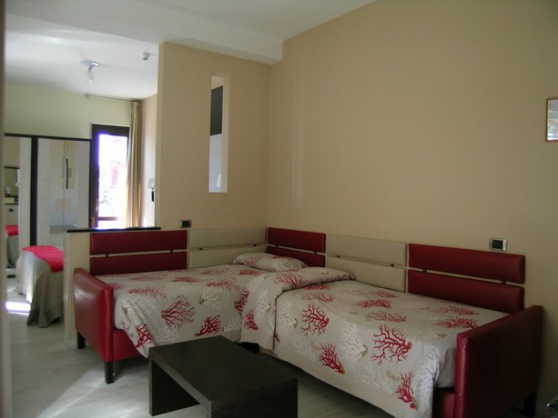 Imagen de la habitación del Hotel Albergo La Marina. Foto 17