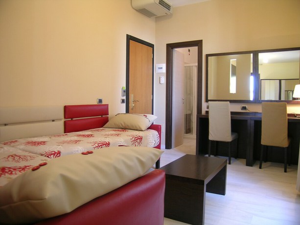 Imagen de la habitación del Hotel Albergo La Marina. Foto 18