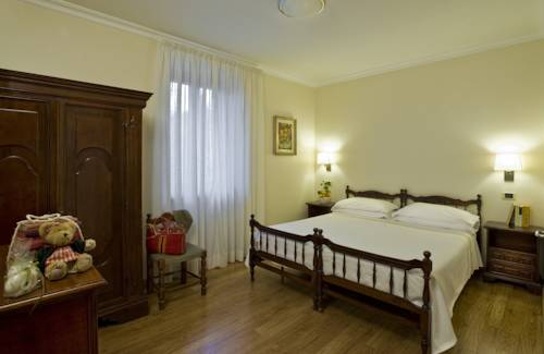Imagen de la habitación del Hotel Albergo La Pace. Foto 6