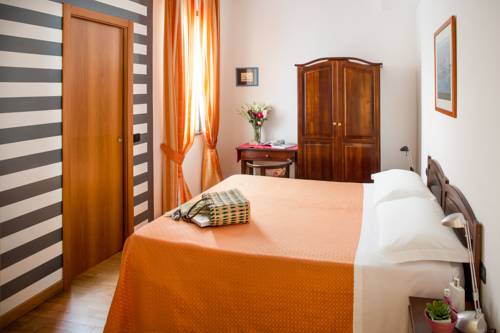 Imagen de la habitación del Hotel Albergo La Piazzetta. Foto 5