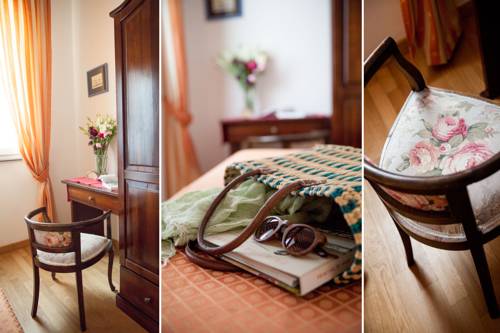 Imagen de la habitación del Hotel Albergo La Piazzetta. Foto 9