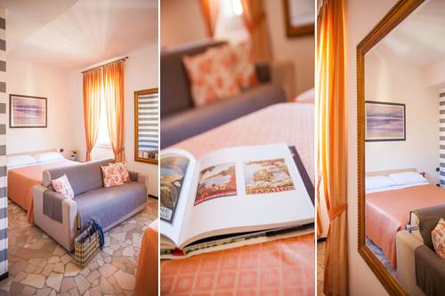 Imagen de la habitación del Hotel Albergo La Piazzetta. Foto 13