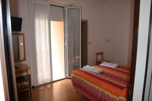 Imagen de la habitación del Hotel Albergo Larenzia. Foto 8
