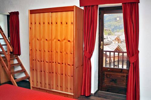 Imagen de la habitación del Hotel Albergo Le Marmotte. Foto 7