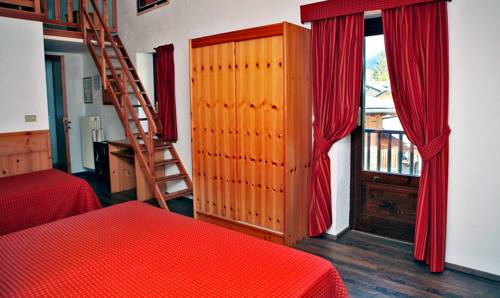 Imagen de la habitación del Hotel Albergo Le Marmotte. Foto 8