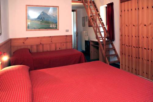Imagen de la habitación del Hotel Albergo Le Marmotte. Foto 9