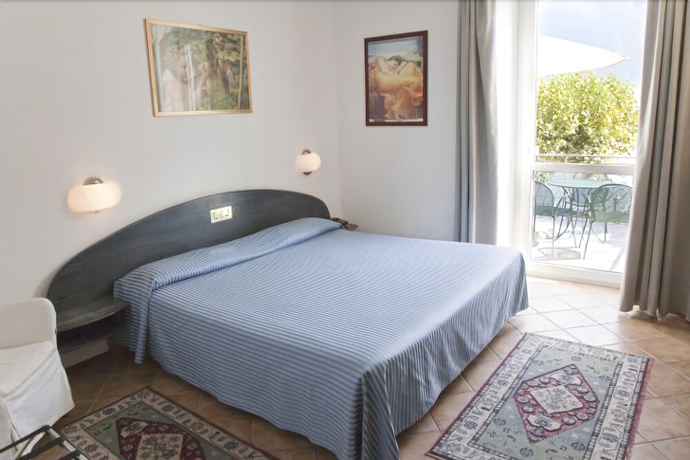 Imagen de la habitación del Hotel Albergo Lenno. Foto 14