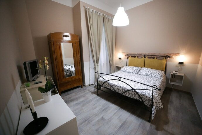 Imagen de la habitación del Hotel Albergo Livorno. Foto 17